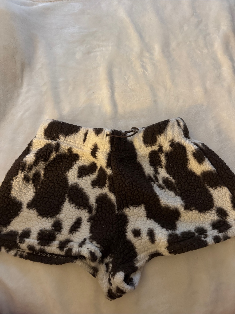No Boundaries Cow-Print Sherpa Shorts - Black & White